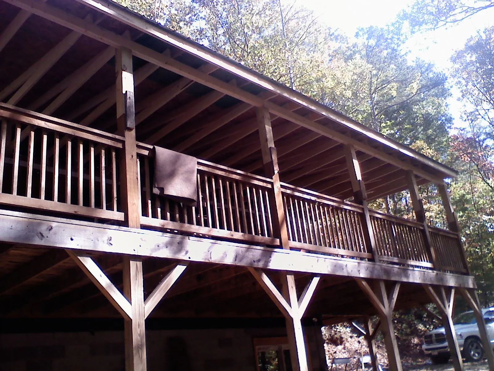 Timber framing under a new elevated porch and deck — Roof Leak Repair in Littleton by Roofing Brothers